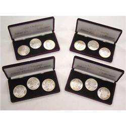 Lot 96 - Lot of 12 New Orleans Morgan Dollars in 4 Plush Sets