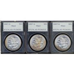 Lot 336 - Lot of Three 1887 Morgan Dollars. 7 over 6 PCGS MS62