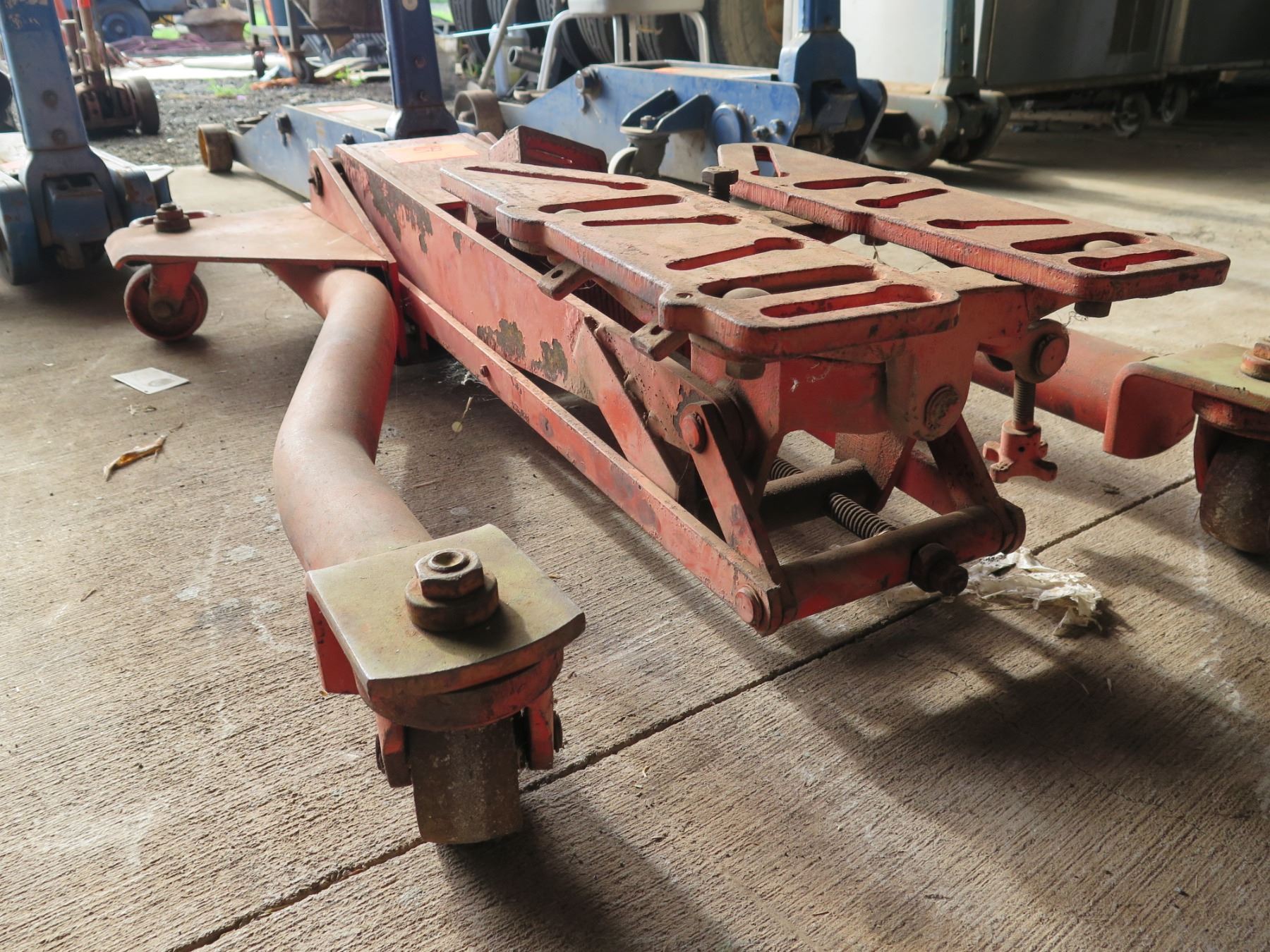 Rolling 4 Caster Red Metal Transmission Floor Jack Lift Oahu