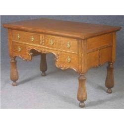 LATE VICTORIAN CARVED OAK DESK