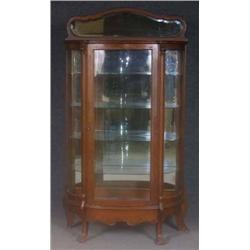LATE VICTORIAN OAK CURVED GLASS CHINA
