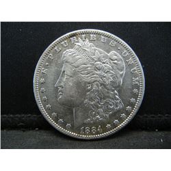 1884 S Morgan Dollar AU/BU