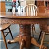 Image 2 : ROUND OAK DINING TABLE WITH LEAF AND 4 HOOPBACK CHAIRS