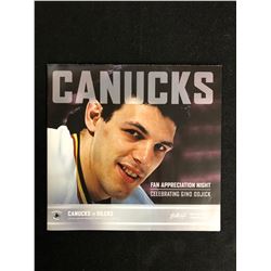 VANCOUVER CANUCKS' GINO ODJICK SIGNED HOCKEY PROGRAM POSTER