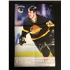 Image 2 : VANCOUVER CANUCKS' GINO ODJICK SIGNED HOCKEY PROGRAM POSTER