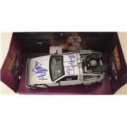 Michael J. Fox & Christopher Lloyd Signed "Back to the Future" DeLorean 1:24 Diecast Car (PSA LOA)