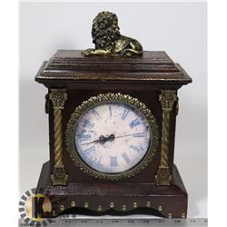 ANTIQUE STYLE LION MOTIF MANTLE CLOCK WITH WOOD