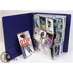 BINDER OF HOCKEY CARDS WITH OVER 36
