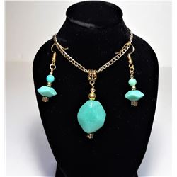 7)  FACETED BLUE JADE PENDANT