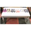 Image 1 : WHITE FABRIC BENCH WITH SHOE DESIGN ON IT,