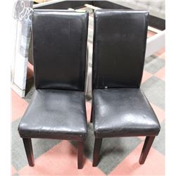 PAIR OF BLACK LEATHERETTE CHAIRS.