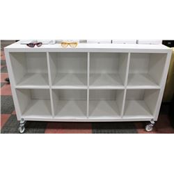 WHITE CUBE SHELF ON CASTORS. FURNITURE