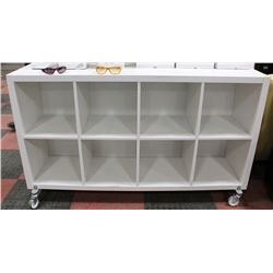 WHITE CUBE SHELF ON CASTORS. FURNITURE