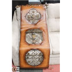 METAL AND LEATHERETTE WALL HANGING