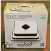 Image 1 : ROBOT SWEEPER.