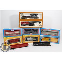 BOX WITH 10 HO SCALE CARS, MOST STILL IN BOXES