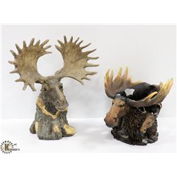 A PAIR OF MOOSE THEMED FIGURINES / CANDLE HOLDERS