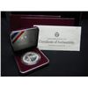 Image 1 : 1988 Proof Dollar with box. Olypmic issue