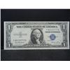 Image 1 : 1935 E Silver $1. Error high series line