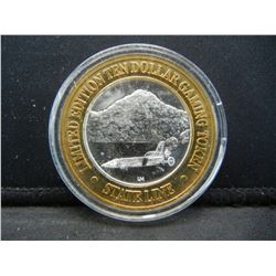 State Line Nevada $10 (.999) silver gambling token.   In capsule.