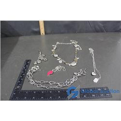 (5) Silver Coloured Necklaces and a Silver Coloured Pendant