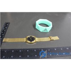 Nixon Green Bangle Watch and a Gold Coloured Time Teller Nixon Watch