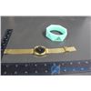 Image 1 : Nixon Green Bangle Watch and a Gold Coloured Time Teller Nixon Watch