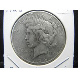 1928 Peace Dollar.  Key date and very low mintage—360,000.