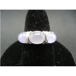 Ladies sterling ring size 7 with lavender stones.  Attractive!