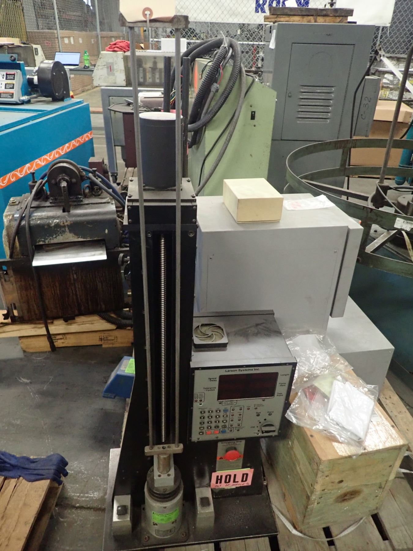 Larson System Spring Testing Machine
