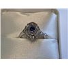 Image 1 : Ladies 14 KT White Gold Custom vintage style ring with oval cut blue sapphire solitaire .33caratwith