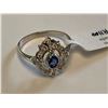 Image 2 : Ladies 14 KT White Gold Custom vintage style ring with oval cut blue sapphire solitaire .33caratwith