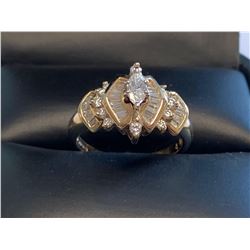 Ladies 14KTGOLD multi diamond cluster dress ring with over 1.00 carat marquise & round cut diamonds.