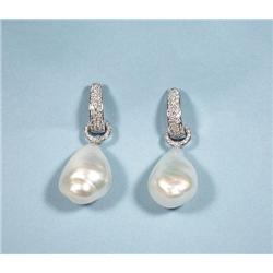 A good pair of pearl and diamond earrings. Pave s
