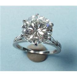 An important platinum and diamond solitaire set w