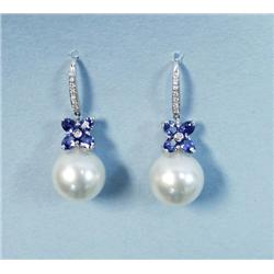 A pair of 18 kt. white gold, sapphire and diamond