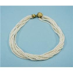 A very good 18 kt. yellow gold, diamond and seed 