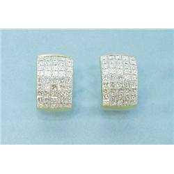 A pair of 18 kt. yellow gold and diamond earrings