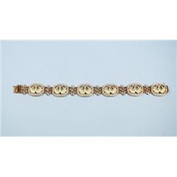 An exquisitely handmade 18 kt. yellow gold and di