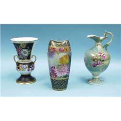 A lot of 3: a pair of German porcelain vases each