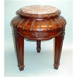 A pair of antique French carved oak pedestals wit