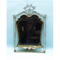 An unusual French gilt bronze framed wall mirror 