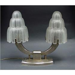 ART DECO - SABINO, PARIS. A chromed metal table l