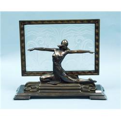 A decorative Art Deco style bronze and glass figu