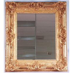 A well carved antique French gilt wood salon mirr