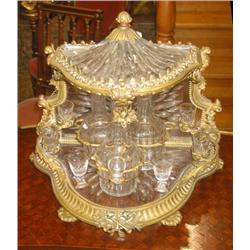 An important antique French Empire style gilt bro