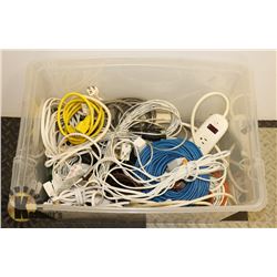 LARGE CLEAR BIN FULL OF EXTENSION CORDS,