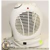 Image 1 : OSCILLATING ELECTRIC HEATER.