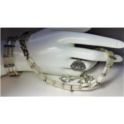 16)  SUITE OF MOTHER OF PEARL AND