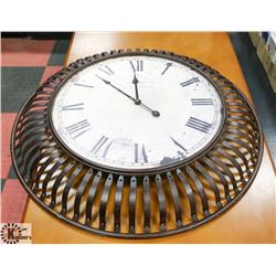 LARGE METAL FRAMED WALL CLOCK. FURNITURE